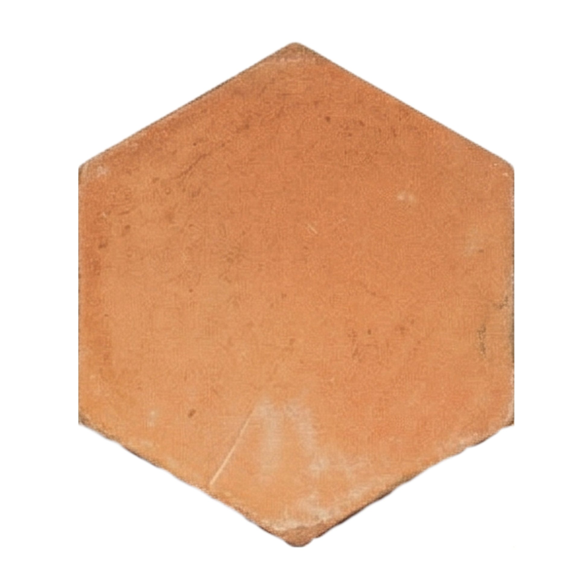 Organic terracotta hexagon tile sample by Clay Imports, displaying its natural orange-brown color and rustic texture.
