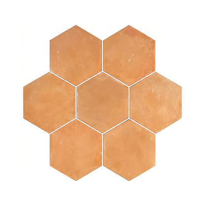 Organic terracotta hexagon tiles by Clay Imports, arranged in a seven-tile cluster with white grout lines.
