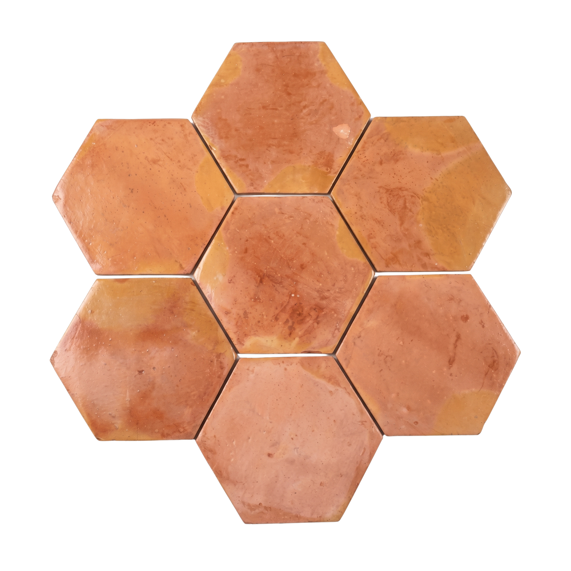 Warm orange-brown hexagonal terracotta tiles by Clay Imports, arranged in a seven-tile cluster with natural color variations and a mottled texture.