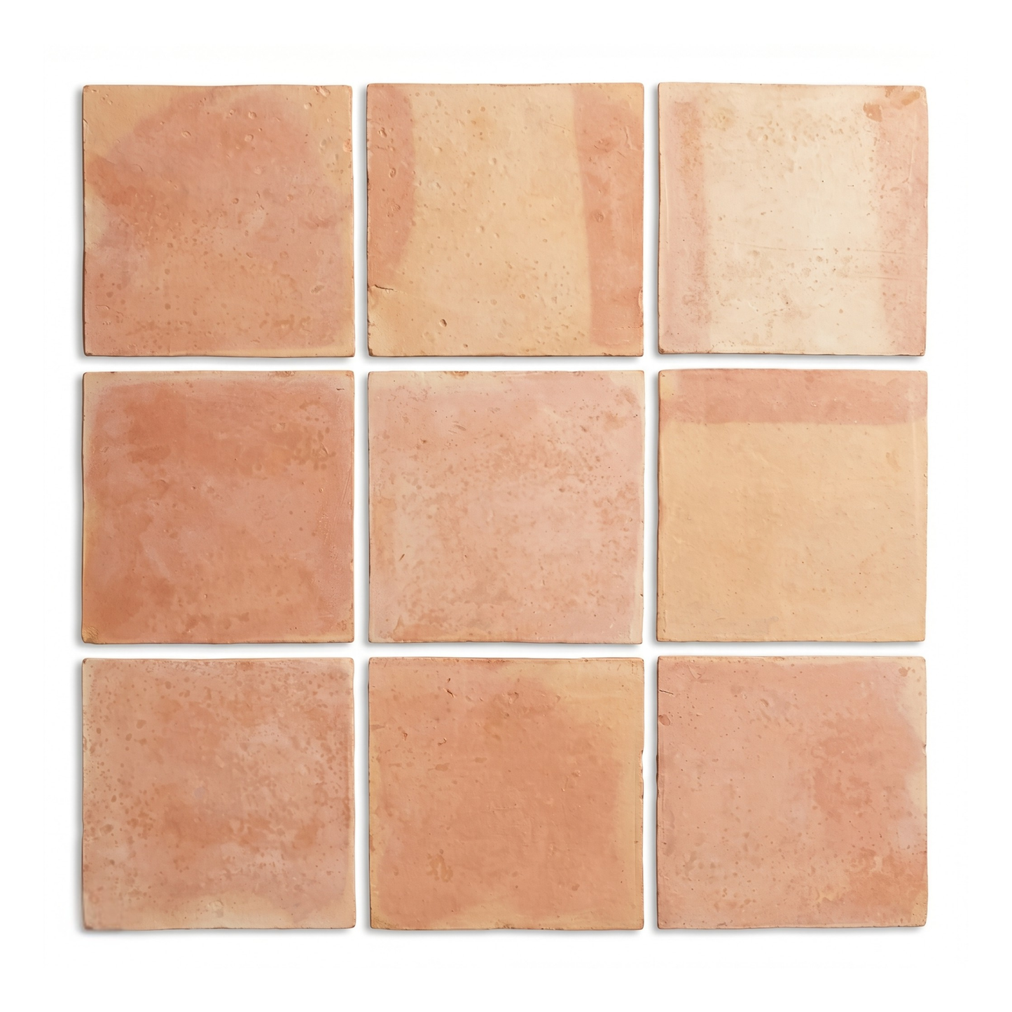 Smooth matte 12x12 terracotta tiles by Clay Imports, arranged in a grid with natural reddish-orange tones and slight texture variations.
