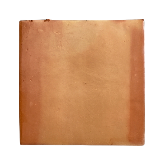 Square terracotta tile sample by Clay Imports, featuring a smooth surface with subtle color variations.