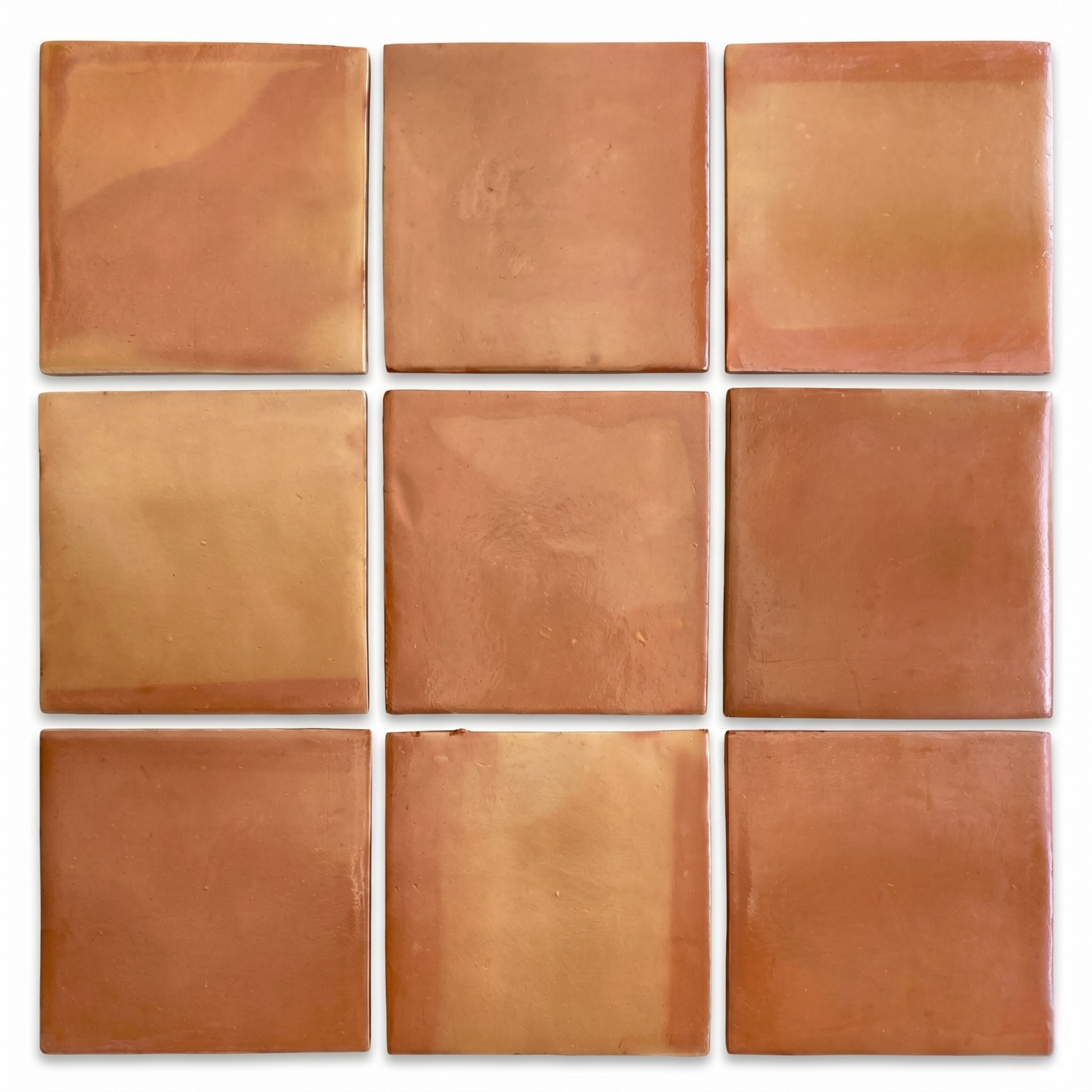 Orange-brown terracotta tiles by Clay Imports arranged in a 3x3 grid, showcasing natural color and texture variations.