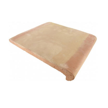 Smooth matte terracotta coping by Clay Imports, shown in an angled view with a rounded bullnose edge.