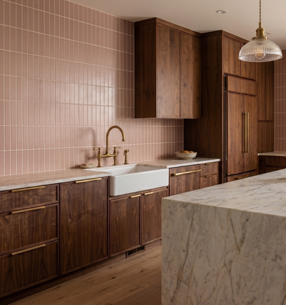 Dusty rose opaque 2x8 clay tile by Clay Imports installed vertically as a kitchen backsplash with white grout.
