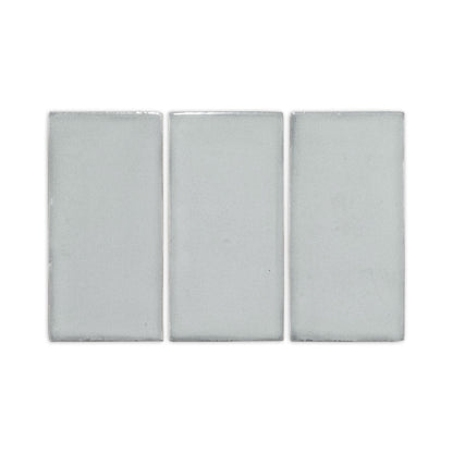 Three light grey rectangular clay tiles by Clay Imports, displayed side-by-side with a subtle handcrafted texture.