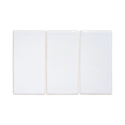 Three white rectangular clay tiles by Clay Imports, with slightly irregular edges and a subtle handmade finish.