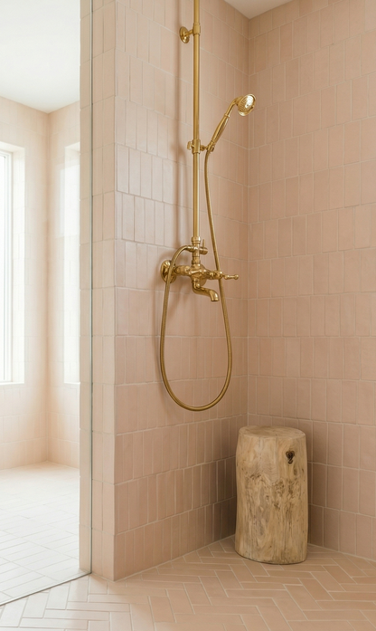 Straw Hat Matte 2x6 subway tiles by Clay Imports, vertically stacked on shower walls and in herringbone on the floor.