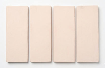 Four Horizon Straw Hat Matte 2x6 tiles by Clay Imports, showing their subtle textured finish.