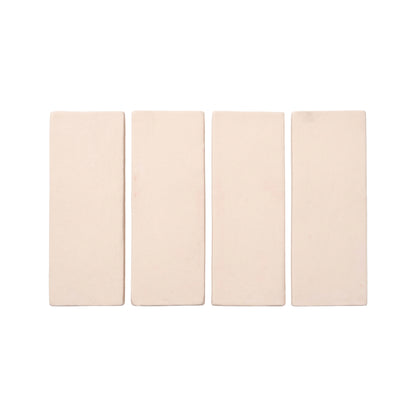 Four Horizon Series Straw Hat Matte 2x6 tiles by Clay Imports, in pale cream with a subtle matte texture, arranged side-by-side.