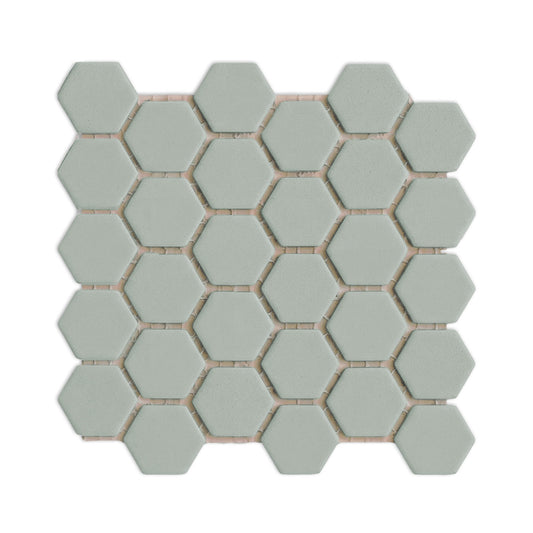 Agave green hexagon clay tiles by Clay Imports, arranged in a cluster with white grout lines.