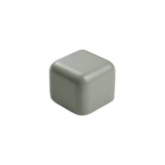 Agave V Cap Corner Solid Tile Trim by Clay Imports, a textured square piece with one rounded top corner.