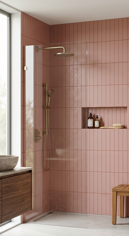 Rosewater Matte 2x12 Solid Tile by Clay Imports, vertically arranged on a modern shower wall with brass fixtures and a built-in niche.