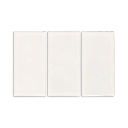 Three white rectangular Candela Gloss samples by Clay Imports, showing slight surface texture and irregular edges.