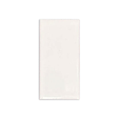 White rectangular clay tile by Clay Imports with a subtle glossy finish and handcrafted texture.