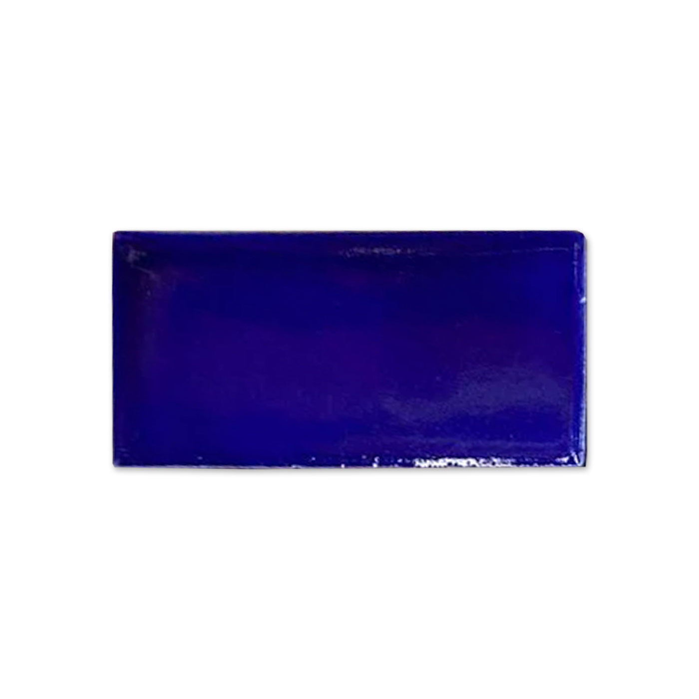 Vibrant cobalt blue rectangular tile sample by Clay Imports with a high-gloss finish.