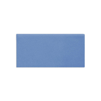 Denim matte clay sample by Clay Imports, a rectangular tile with a subtly textured blue surface.