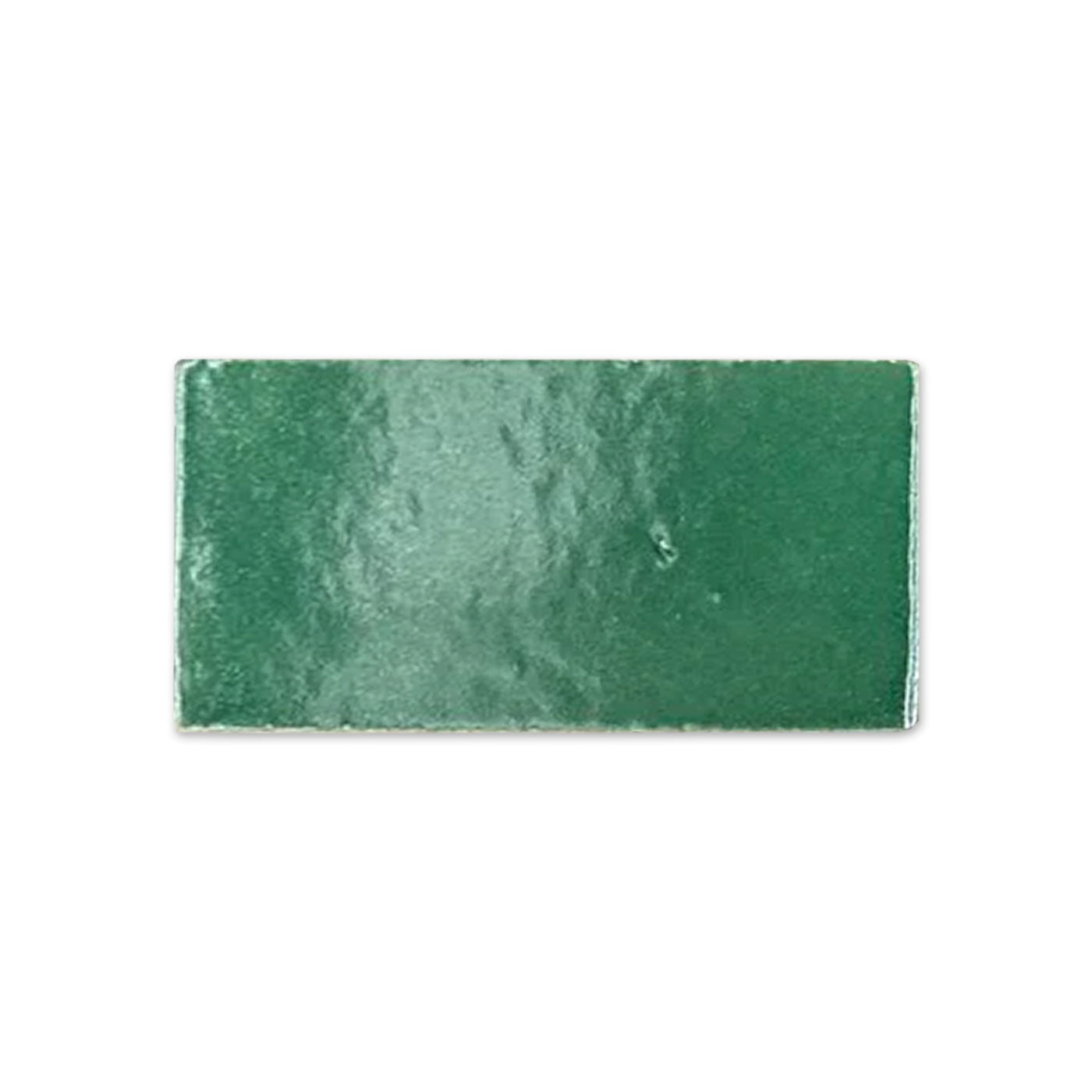 Green glossy rectangular tile sample by Clay Imports with a slightly uneven, reflective surface.