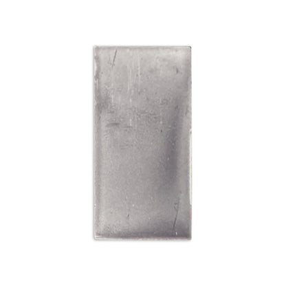 Graphite gray clay shape by Clay Imports with a textured surface and subtle variations.