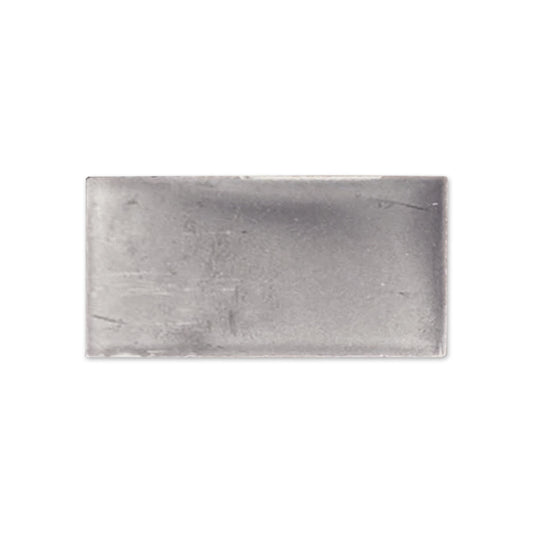 Graphite gloss tile sample by Clay Imports, a dark grey rectangular piece with subtle texture and soft edges.