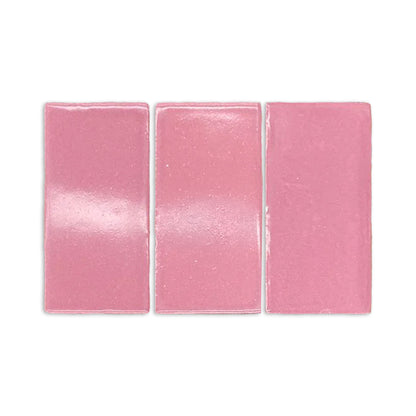 Pink hibiscus gloss sample by Clay Imports, three rectangular tiles with a glossy, slightly textured finish.