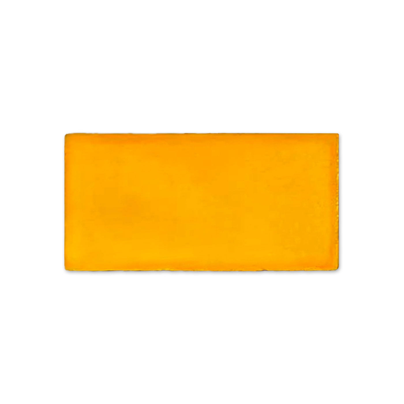 Bright orange-yellow Mango Gloss Sample from Clay Imports, a rectangular block with slightly uneven edges.