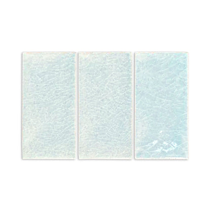 Three light blue Rain Crackle Gloss sample tiles by Clay Imports, featuring a crackled texture.