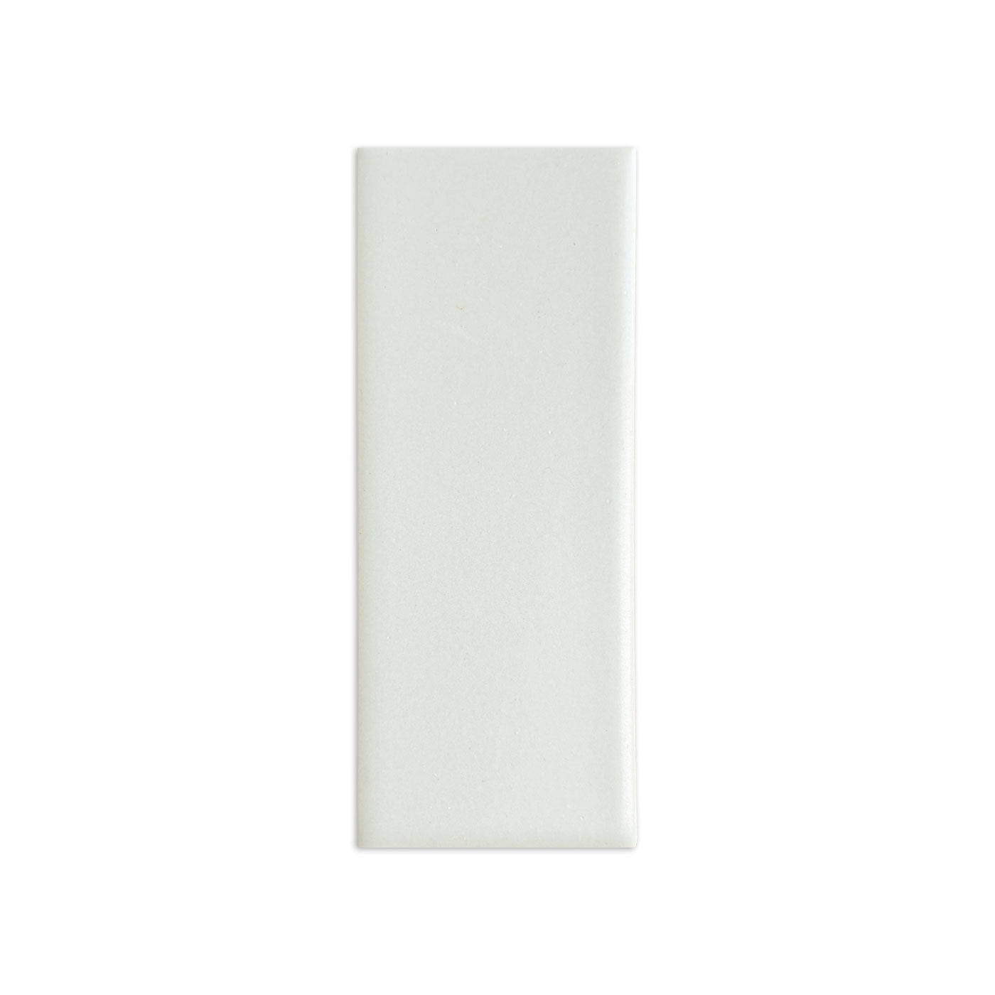 Off-white matte rectangular sample tile from Clay Imports with a subtle granular texture.