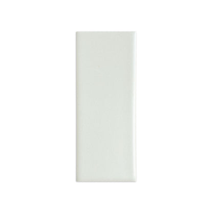 Off-white matte rectangular sample tile from Clay Imports with a subtle granular texture.