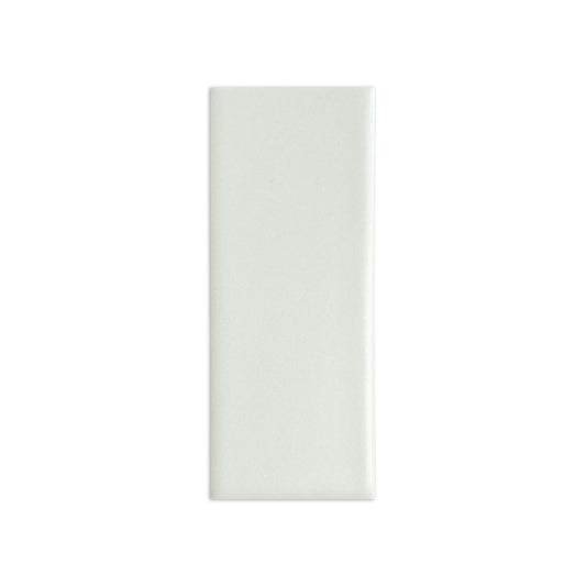 Off-white matte rectangular sample tile from Clay Imports with a subtle granular texture.