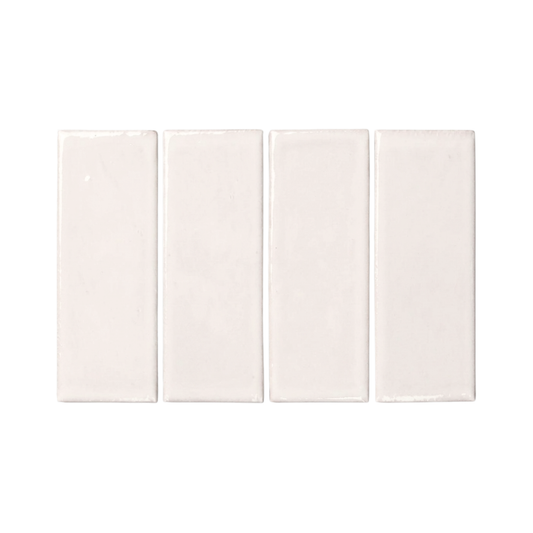 Four light off-white rectangular clay tiles by Clay Imports, arranged in a row, showing glossy, slightly textured surfaces.