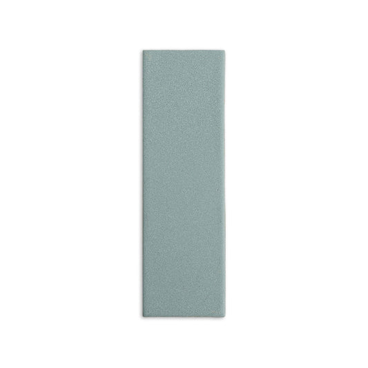 Pale sage green Hot Spring 2x6 tile sample by Clay Imports with a matte, subtly textured finish.