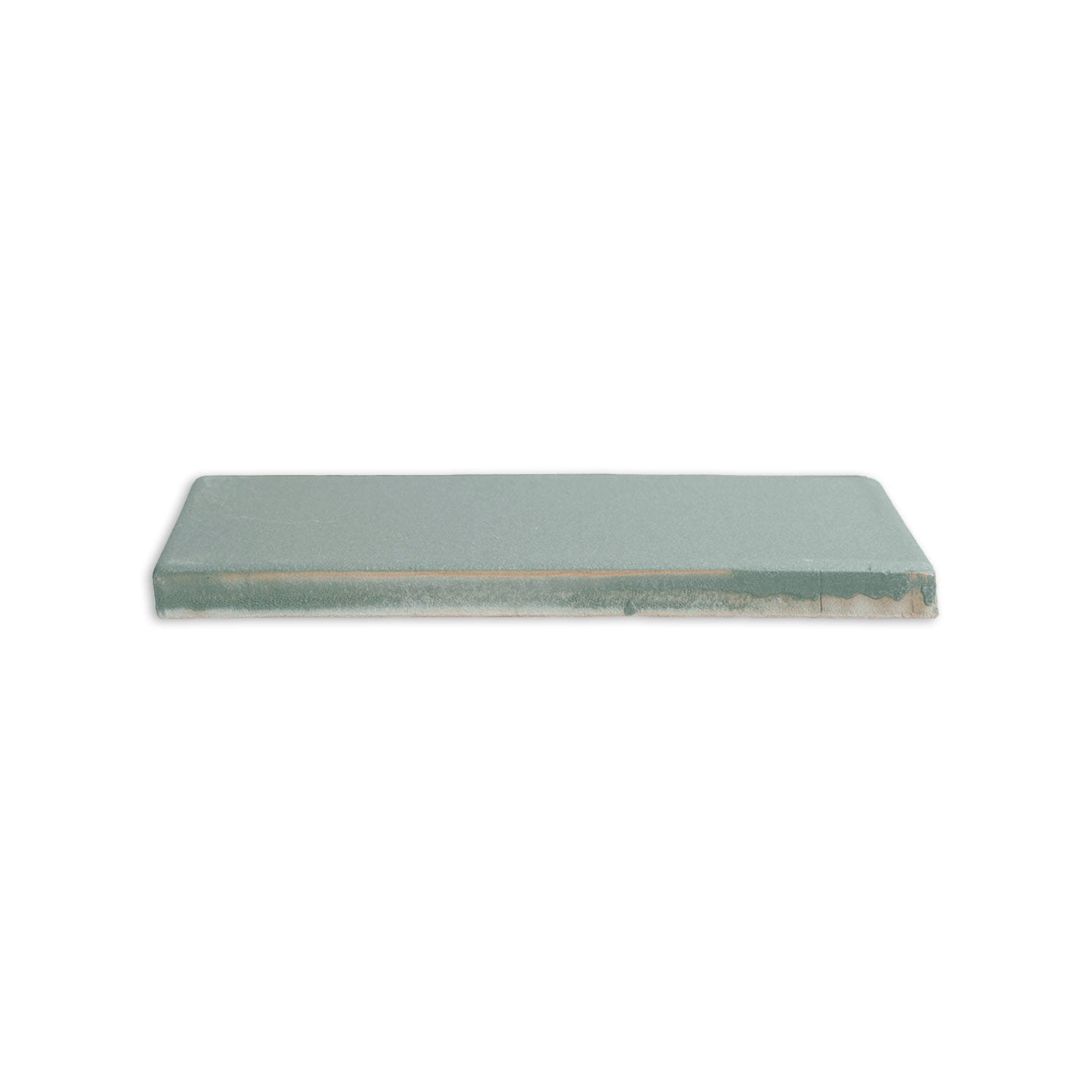 Rectangular Hot Spring clay tile by Clay Imports, showing its unglazed side with a tan edge and speckled texture.