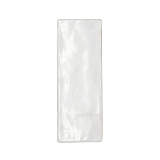 Rectangular Perla gloss tile sample by Clay Imports with a handcrafted, wavy surface and slightly irregular edges.