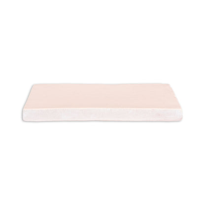 Matte pale peach rectangular tile by Clay Imports with a visible unglazed side edge.
