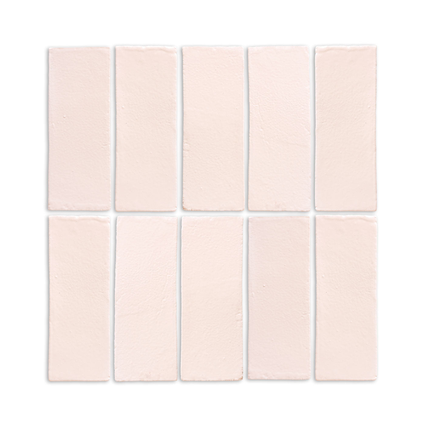 Ten Straw Hat Matte 2x6 tiles by Clay Imports, showing their light beige color and textured surface.