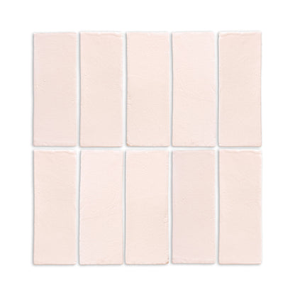 Ten Straw Hat Matte 2x6 tiles by Clay Imports, showing their light beige color and textured surface.