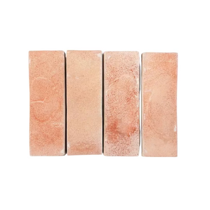 Four matte terracotta tile samples by Clay Imports, 2x6, arranged vertically with varied reddish-orange tones.