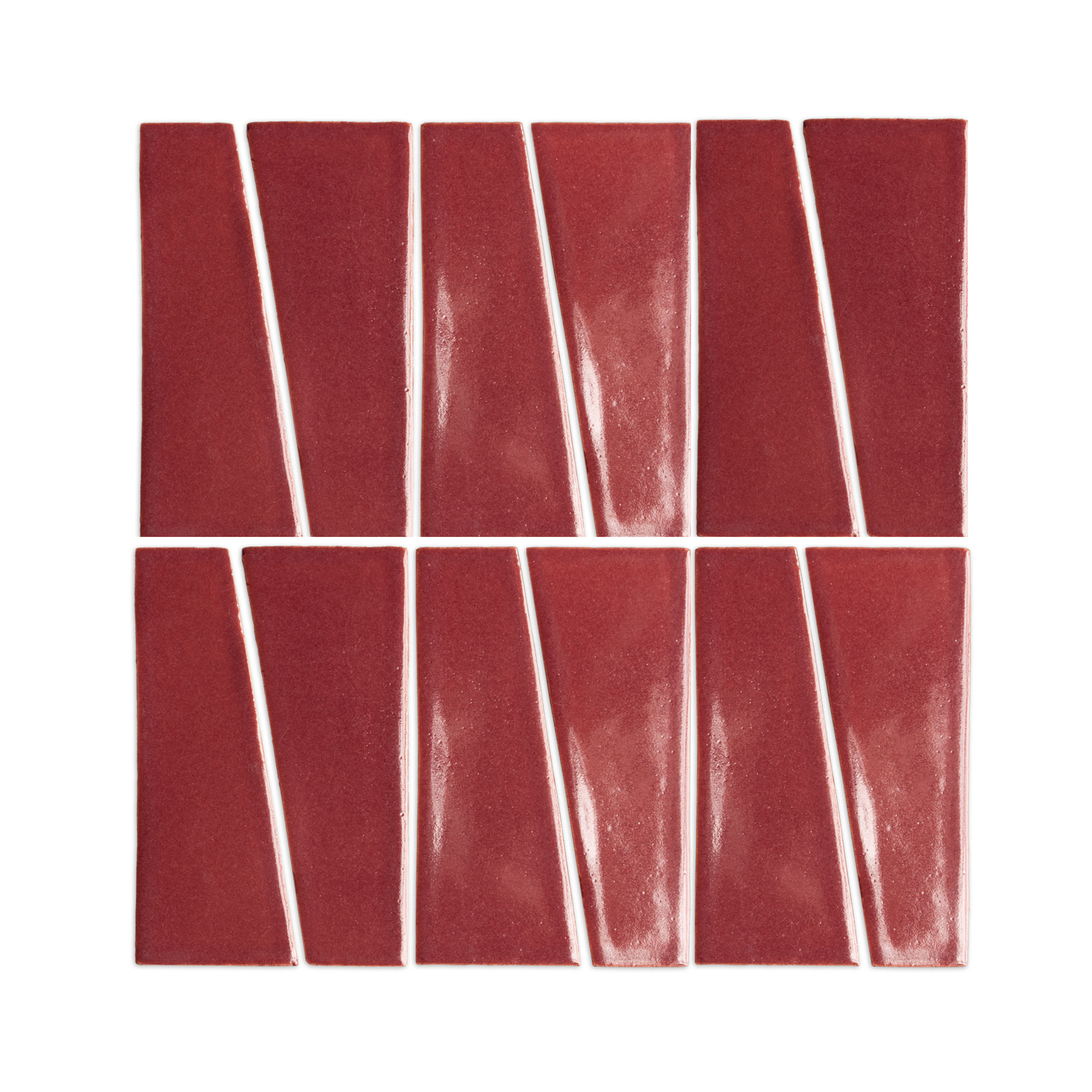 Plum clay tiles in a trumpet 2x6 shape by Clay Imports, arranged in an angular pattern with subtle textured finish.