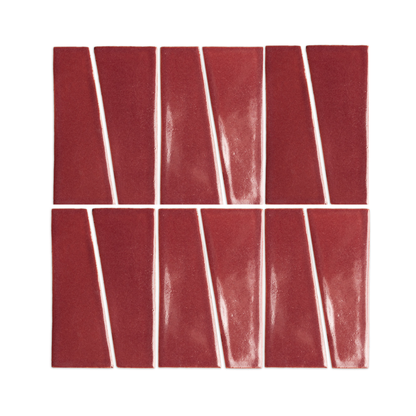 Plum clay tiles in a trumpet 2x6 shape by Clay Imports, arranged in an angular pattern with subtle textured finish.
