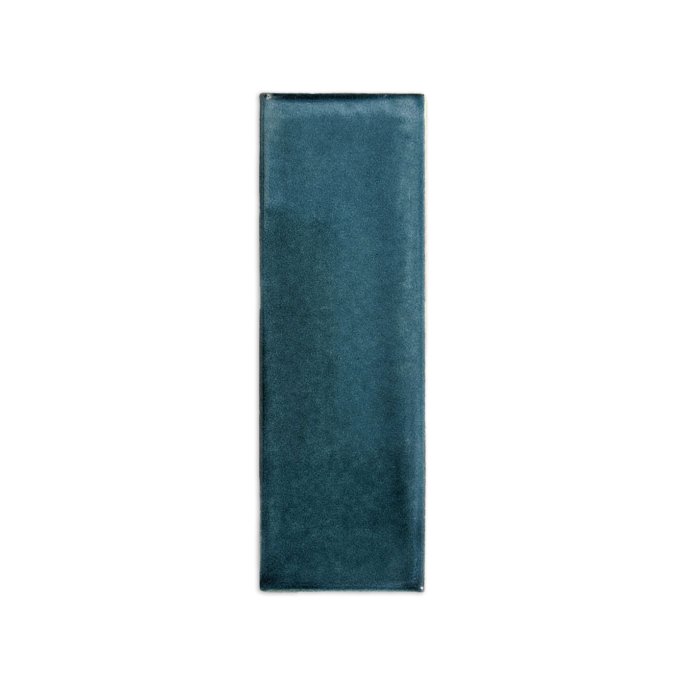 Botanical Teal Subway Solid Tile Trim with glazed edges by Clay Imports, featuring a glossy finish, displayed vertically.
