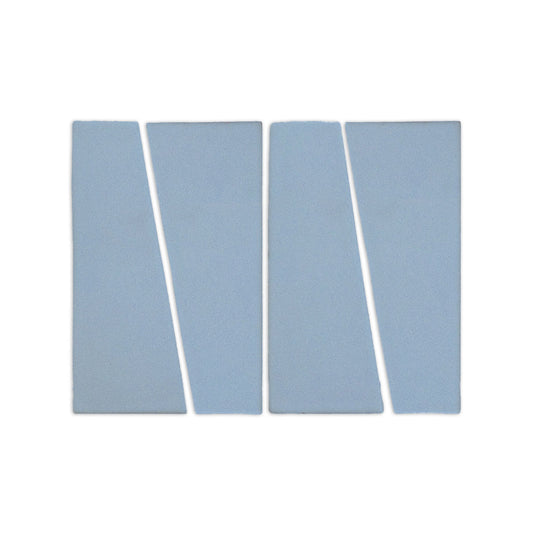 Trumpet Blue Agate shape clay tiles by Clay Imports, light blue with diagonal cuts creating a zigzag pattern and subtle texture.