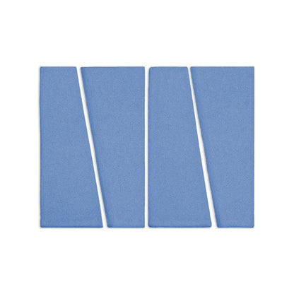Four blue Trumpet Denim clay tiles by Clay Imports, with a matte texture and slanted geometric edges.