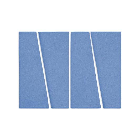 Four blue Trumpet Denim clay tiles by Clay Imports, with a matte texture and slanted geometric edges.