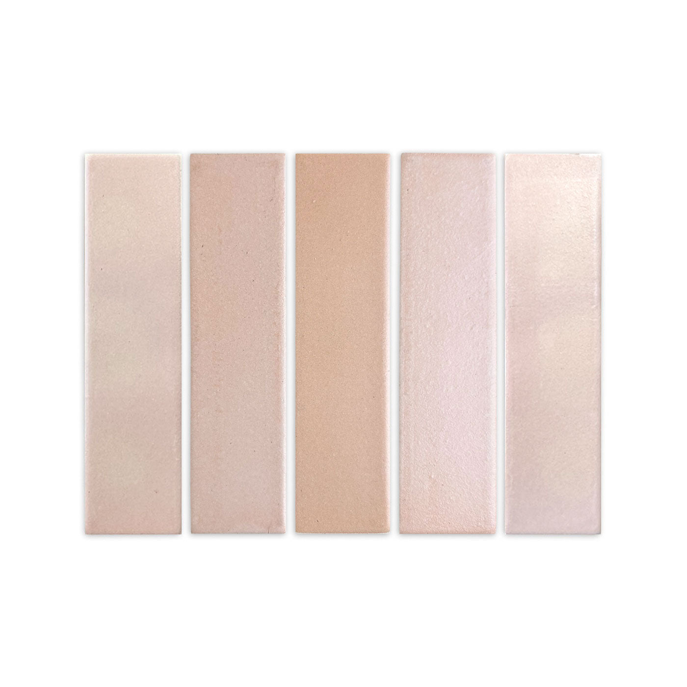 Opaque clay tiles by Clay Imports in varied light pink, beige, and tan shades with a subtly textured finish.