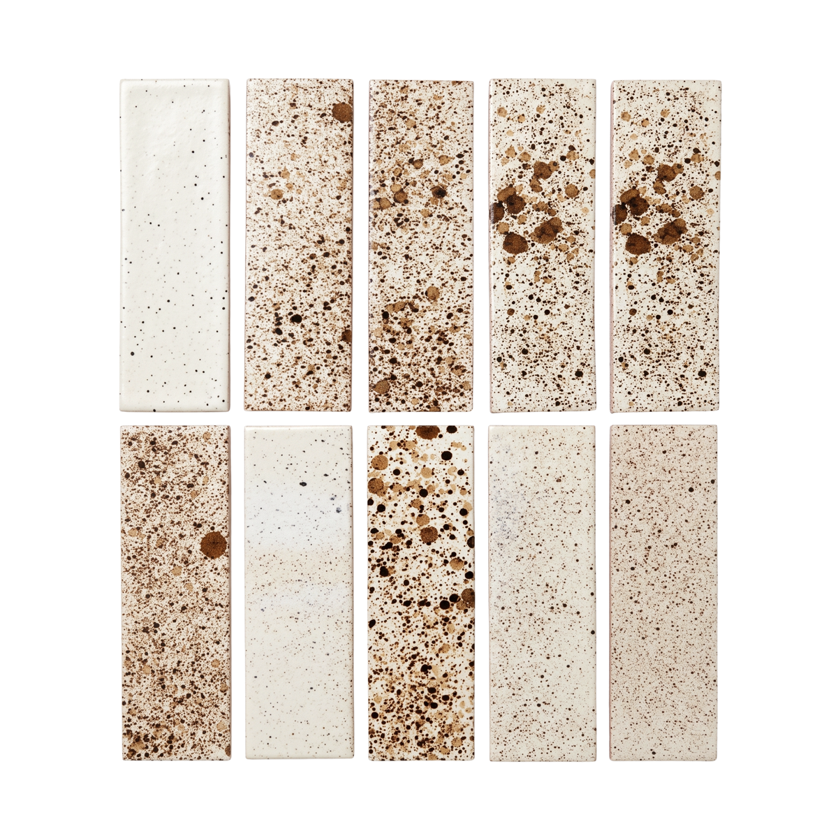 Nine rectangular ceramic subway tiles arranged in a 3-by-3 grid on a plain white background. The tiles feature a speckled glaze in cream, beige, and brown tones, with some pieces showing larger brown mineral inclusions.