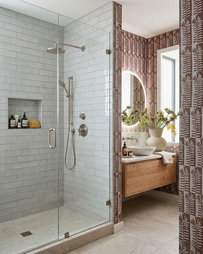 Light gray Static 2x8 clay tiles by Clay Imports lining a modern shower with glass enclosure and brushed nickel fixtures.