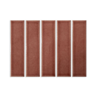 Five rectangular 2x8 Tamarindo Gloss tiles by Clay Imports, showcasing a distinct cracked glaze.