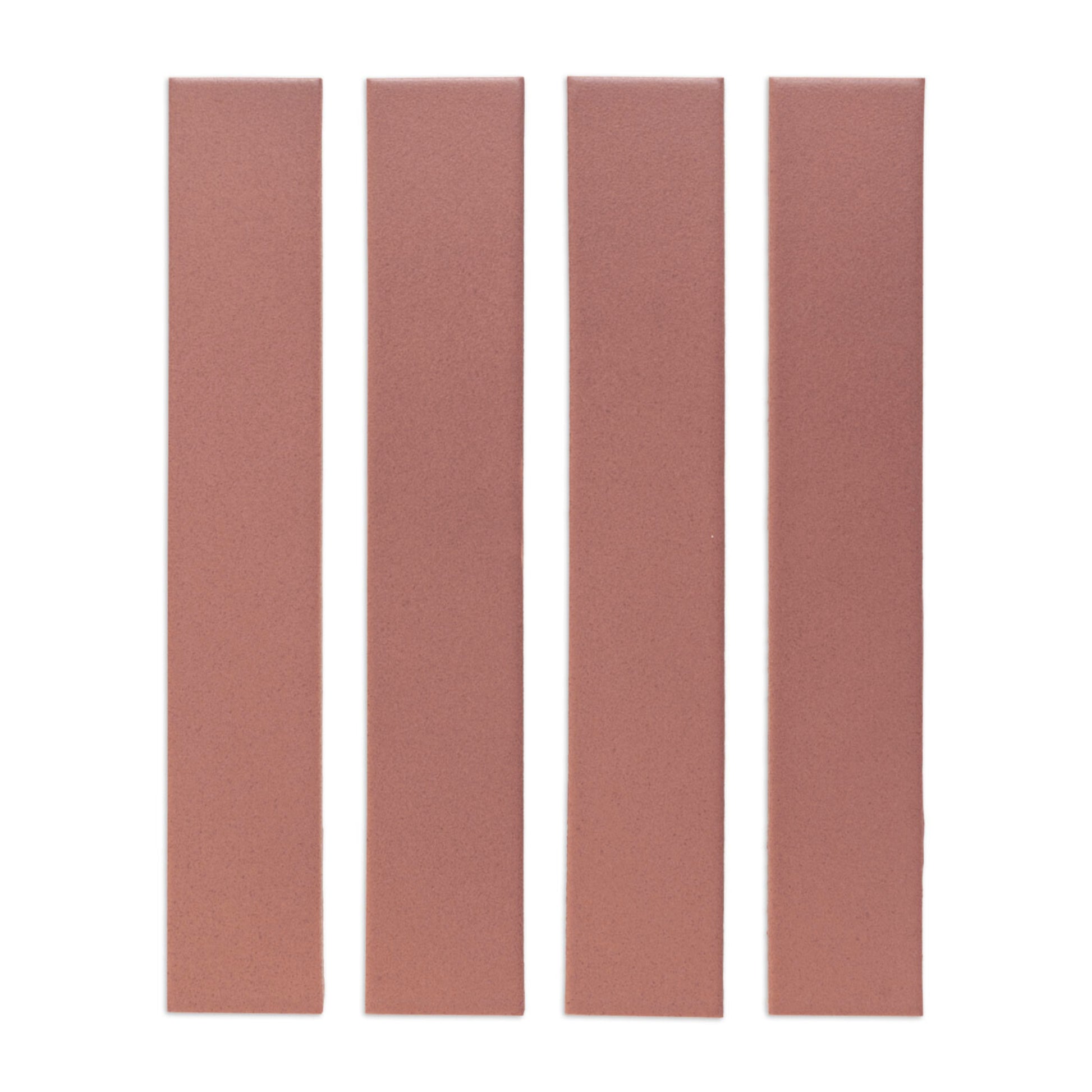 Four reddish-brown Lava Rock Matte 2x12 solid tiles by Clay Imports, with a granular texture.