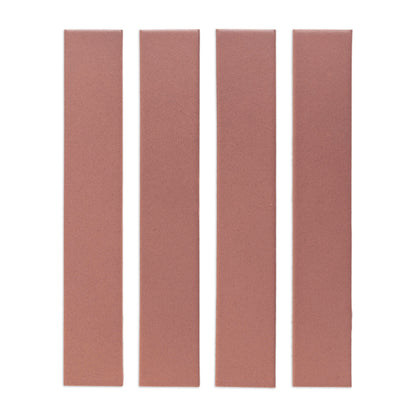 Four reddish-brown Lava Rock Matte 2x12 solid tiles by Clay Imports, with a granular texture.
