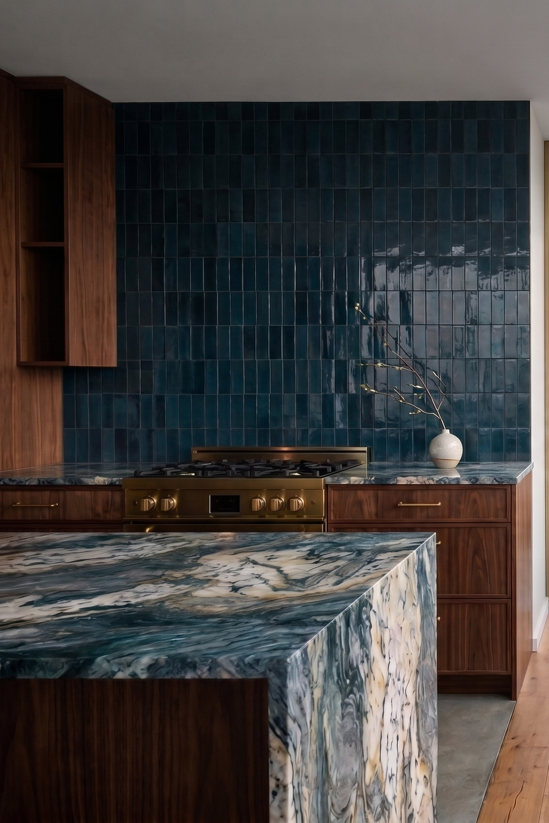 Rio 2x6 Solid Tile by Clay Imports, a glossy dark teal backsplash with an uneven finish.